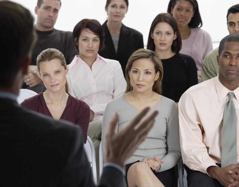 Employees Listening to Presentation the non verbal elements of personal impact